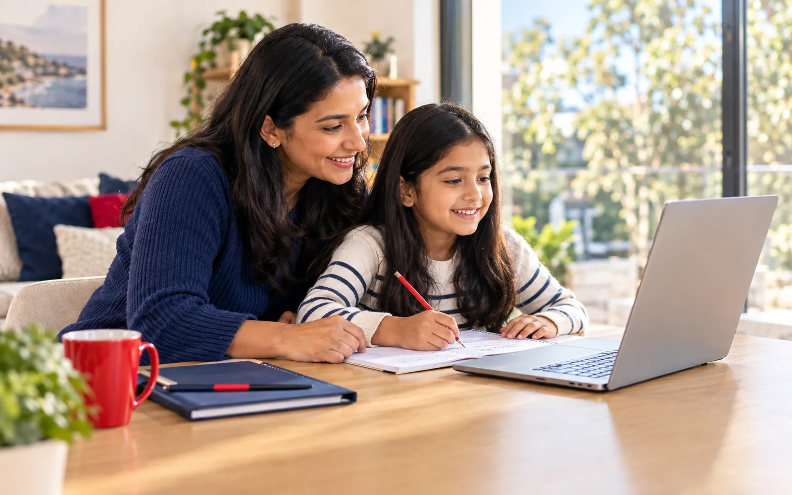 Parent and primary-school child learning with an online tutor at home